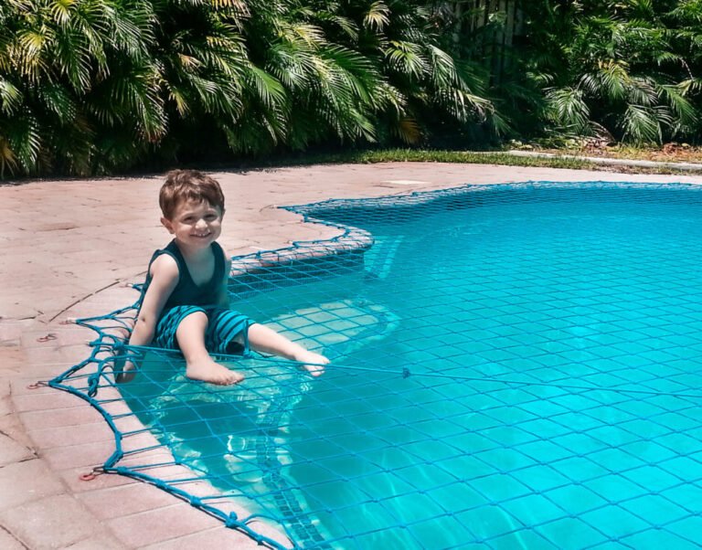 kid-on-net-new-1024x802 - The Pool Fence Custom pool safety net installation 8