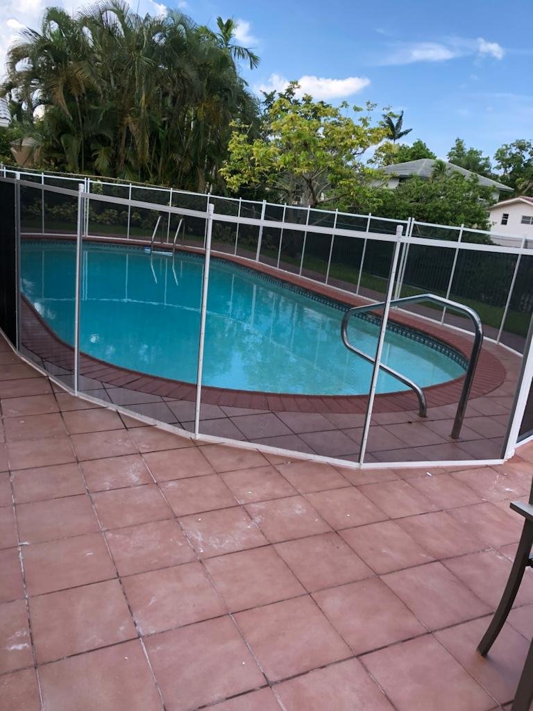 WhatsApp Image 2023-10-04 at 18.47.23 - The Pool Fence Removable mesh pool fence installation 13