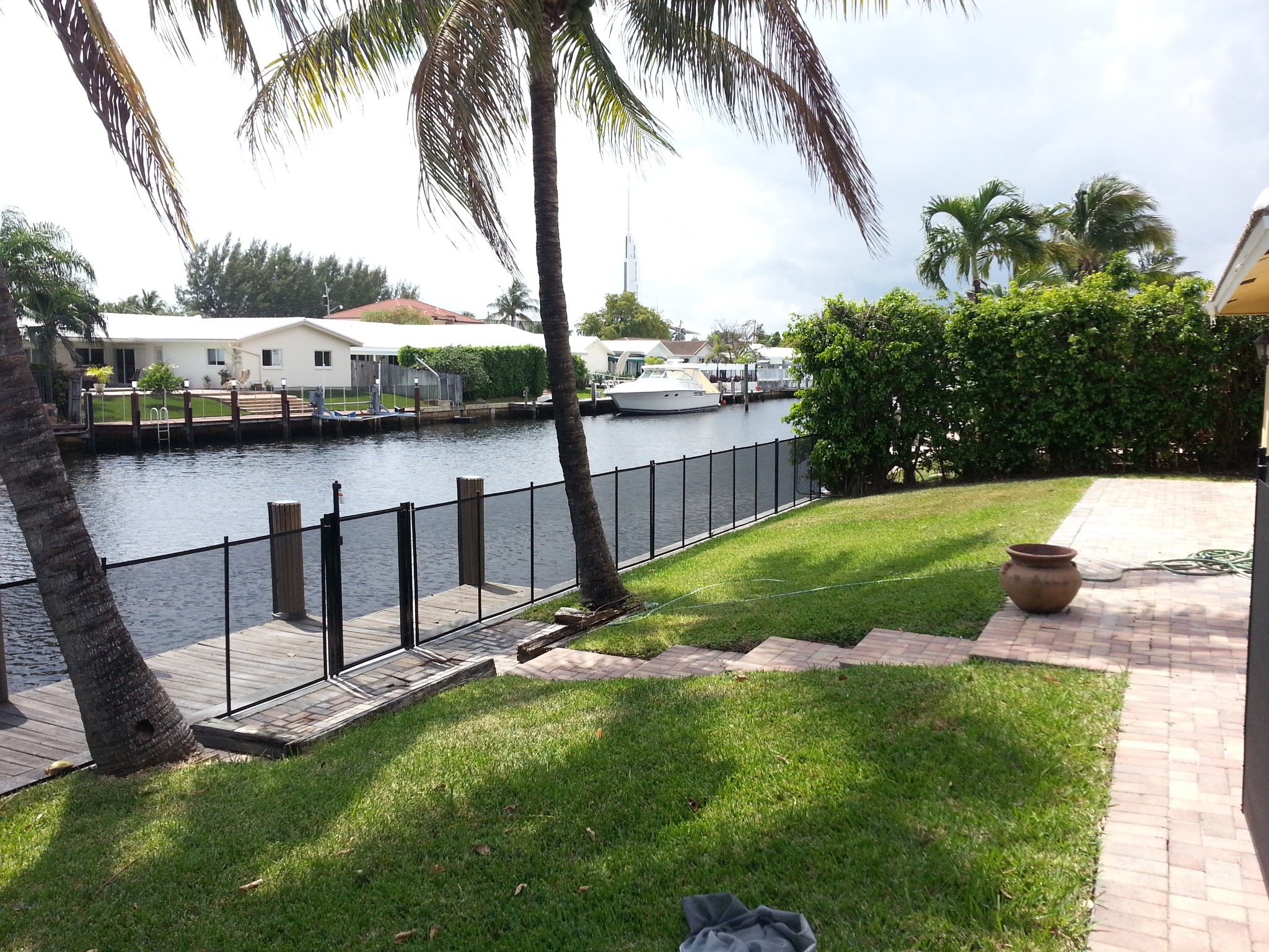 Black removable safety fence installed at a waterfront home in Miami Beach, Florida